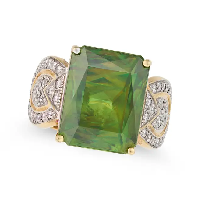 A FINE SPHENE AND DIAMOND RING in 18ct yellow gold, set with an octagonal mixed cut sphene of
