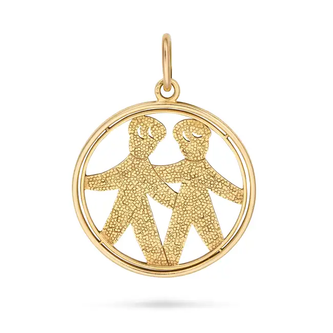 CARTIER, A VINTAGE GOLD GEMINI ZODIAC PENDANT in 18ct yellow gold, the openwork pendant designed