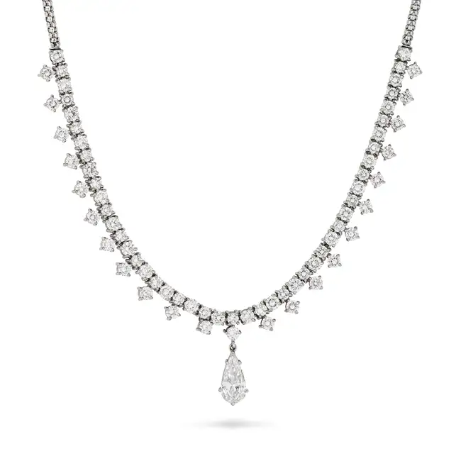 A FINE DIAMOND NECKLACE set with a row of round brilliant cut diamonds, suspending a row of round