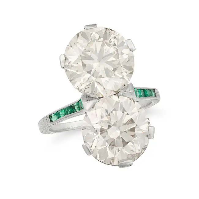 A FINE ART DECO OLD CUT DIAMOND AND EMERALD DRESS RING set with two old European cut cut diamonds of