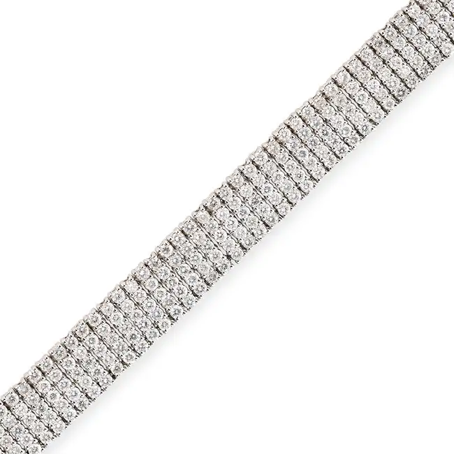 A DIAMOND BRACELET in 18ct white gold, comprising five rows of round brilliant cut diamonds