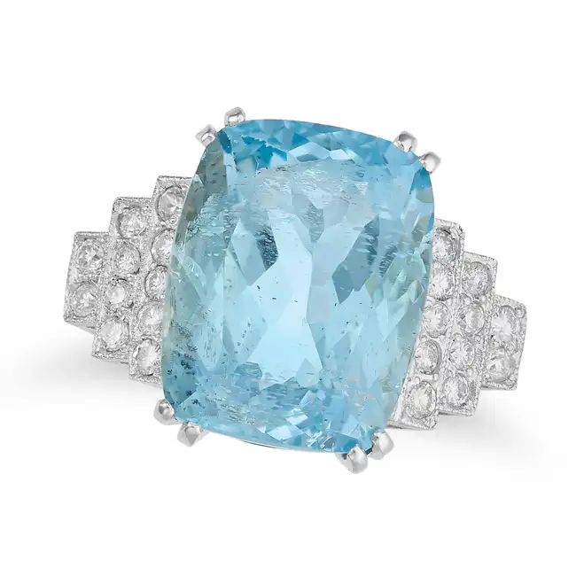 AN AQUAMARINE AND DIAMOND RING set with a cushion cut aquamarine of approximately 8.15 carats, the