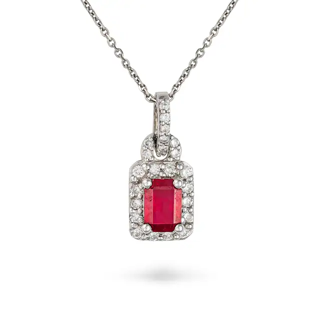 A RUBY AND DIAMOND PENDANT NECKLACE the pendant set with an octagonal step cut ruby of approximately