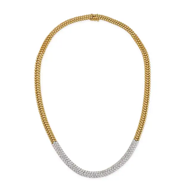 A DIAMOND NECKLACE in beaded design, the central section set with round brilliant cut diamonds all