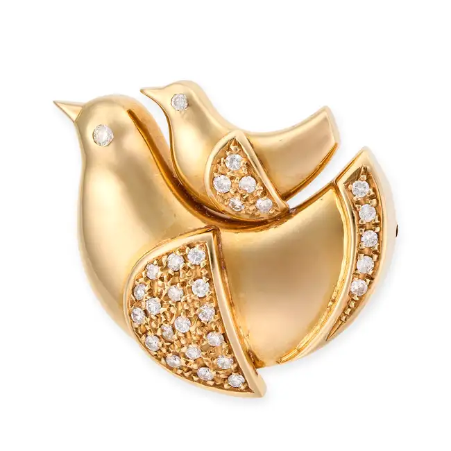 A DIAMOND DOVE BROOCH / PENDANT designed as a dove with its chick, set with round brilliant cut