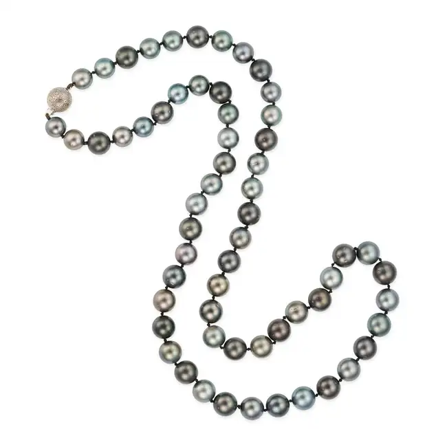 A TAHITIAN BLACK PEARL NECKLACE comprising a row of black pearls ranging from 9.9mm-11.7mm, clasp