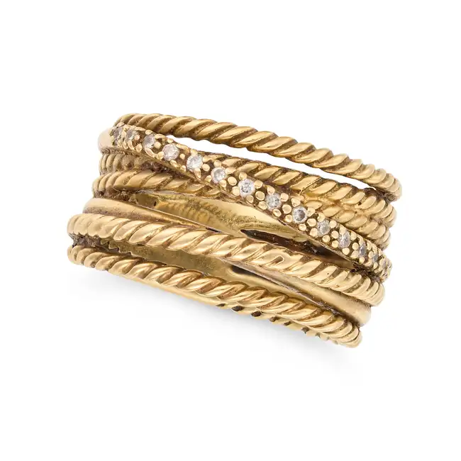 DAVID YURMAN, A DIAMOND CROSSOVER RING comprising seven bands in ropework design, one set with round