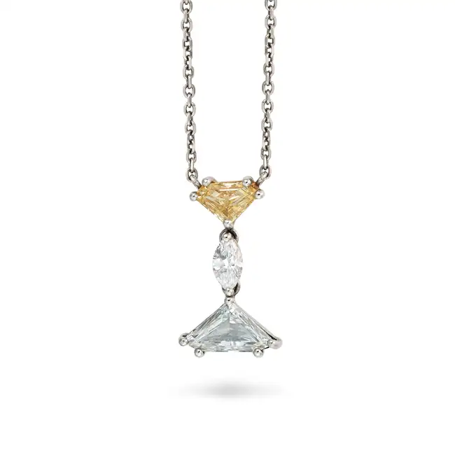A FANCY COLOUR DIAMOND PENDANT NECKLACE in platinum, the pendant set with a fancy cut yellow diamond