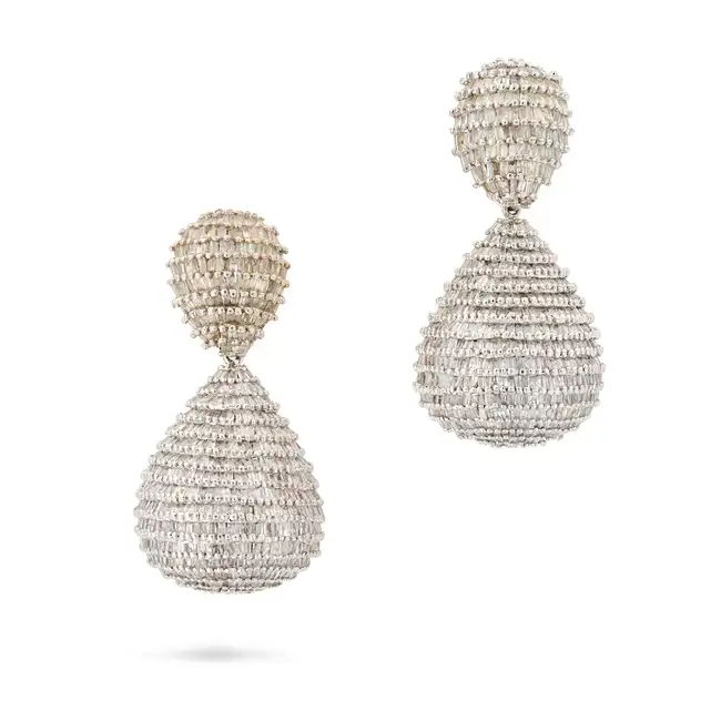 A PAIR OF DIAMOND DROP EARRINGS in 18ct white gold, comprising a domed pear shaped cluster of