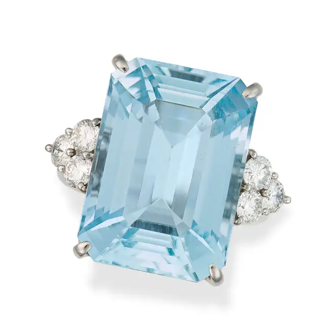 A FINE AQUAMARINE AND DIAMOND DRESS RING set with an octagonal step cut aquamarine of 16.42
