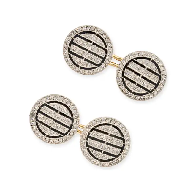 CARTIER, A PAIR OF ANTIQUE ART DECO DIAMOND AND ENAMEL CUFFLINKS in circular form, set with rose cut