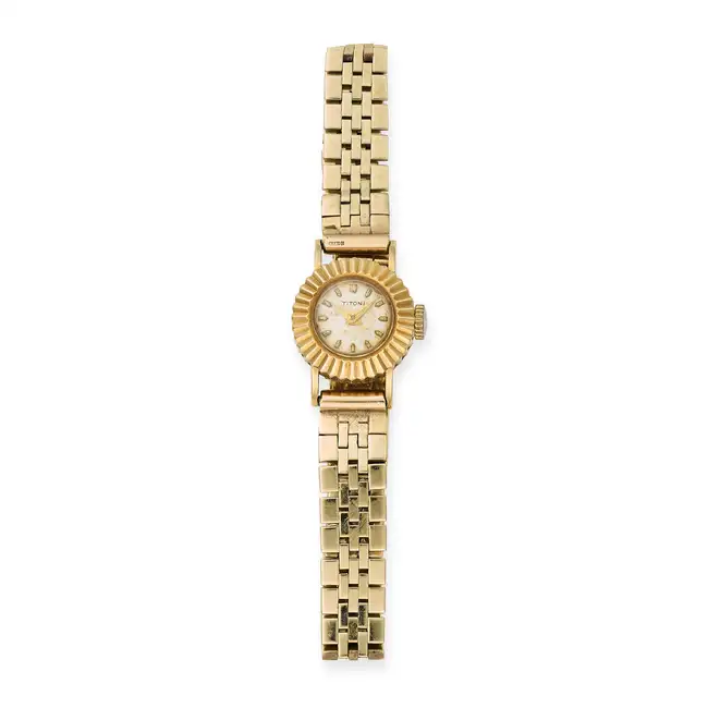 TITONI, A VINTAGE WRISTWATCH in yellow gold, the circular watch face with baton hour markers, on a