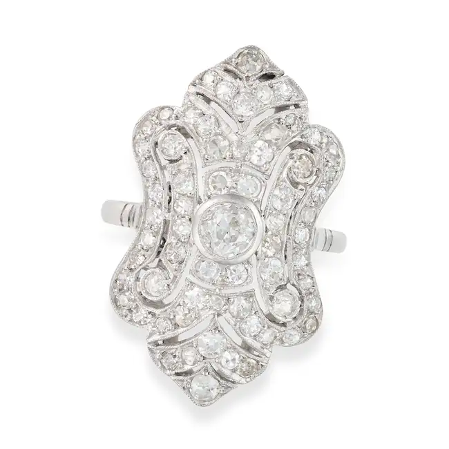 A FINE DIAMOND DRESS RING in Art Deco design, the openwork geometric ring set with old and single