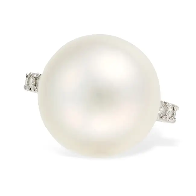 A SOUTH SEA PEARL AND DIAMOND RING set with a South Sea pearl of 16.0mm, the eternity band set all