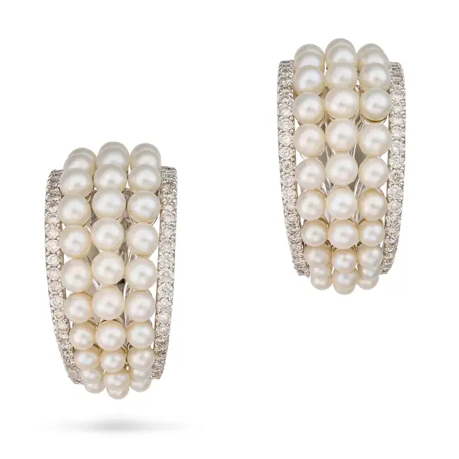 A PAIR OF PEARL AND DIAMOND HOOP EARRINGS each designed as a half hoop set with three graduating