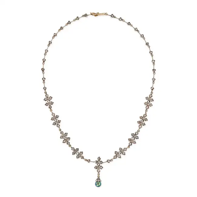 AN ANTIQUE DIAMOND AND BLACK PEARL PENDANT NECKLACE the necklace in foliate design, set throughout