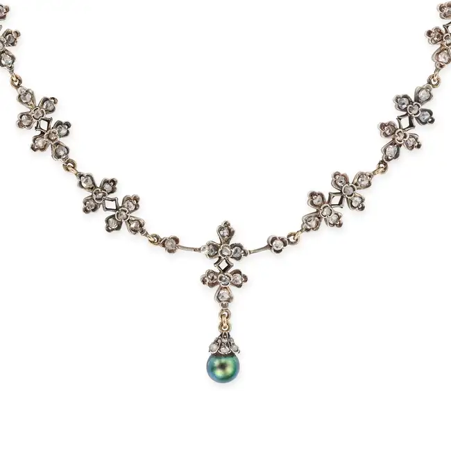 AN ANTIQUE DIAMOND AND BLACK PEARL PENDANT NECKLACE the necklace in foliate design, set throughout