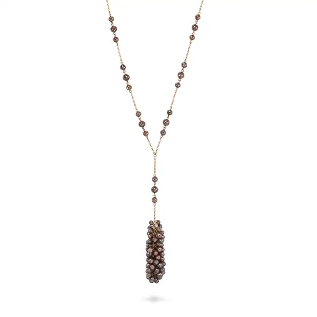 A COGNAC DIAMOND PENDANT NECKLACE in 18ct yellow gold, comprising a trace chain set with faceted