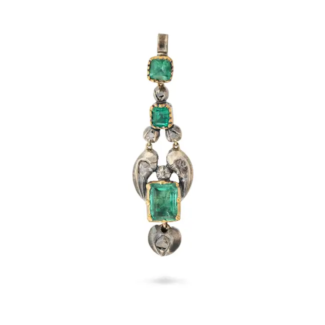 AN ANTIQUE EMERALD AND DIAMOND PENDANT, 19TH CENTURY the articulated pendant set with octagonal step