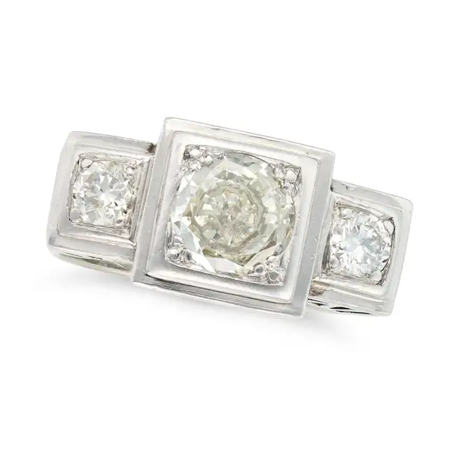 A RETRO DIAMOND THREE STONE RING in platinum and 18ct white gold, set with a transitional cut