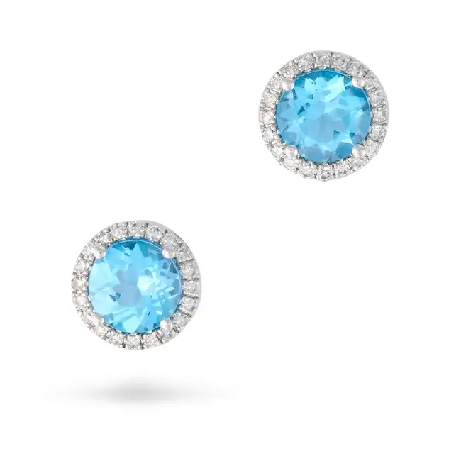 NO RESERVE - A PAIR OF BLUE TOPAZ AND DIAMOND STUD EARRINGS in 9ct white gold, each set with a round