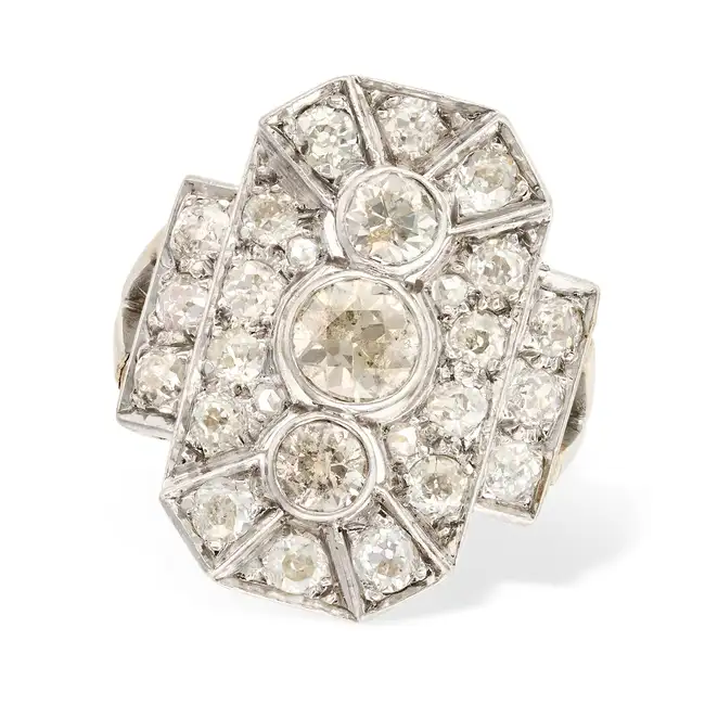 AN ART DECO DIAMOND DRESS RING the geometric ring set with three principal old European cut