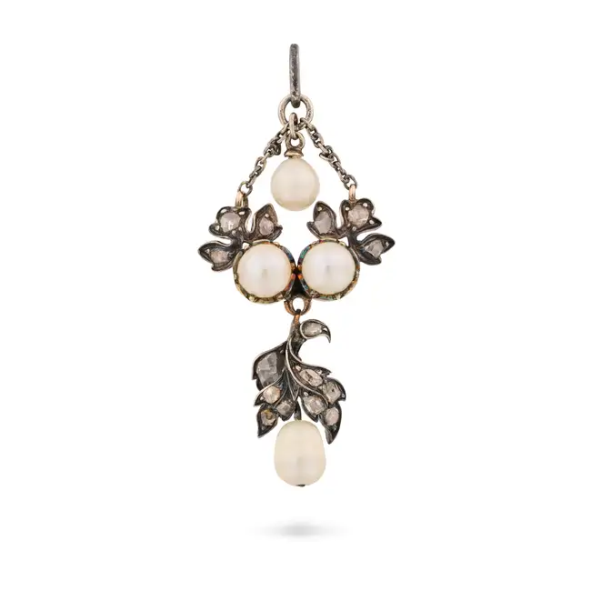 AN ANTIQUE PEARL AND DIAMOND PENDANT the pendant in foliate design, set with pearls and accented
