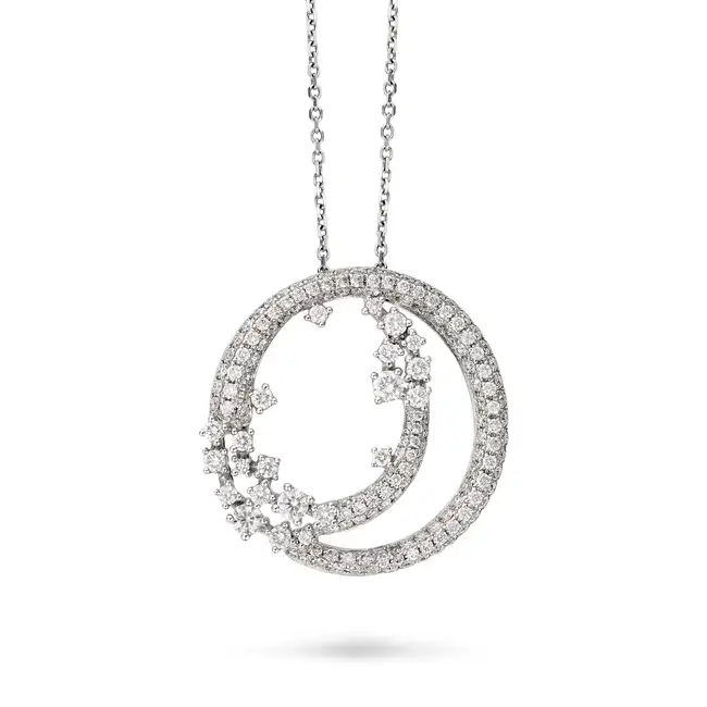 A DIAMOND PENDANT NECKLACE in 18ct white gold, the stylised pendant set with round brilliant cut