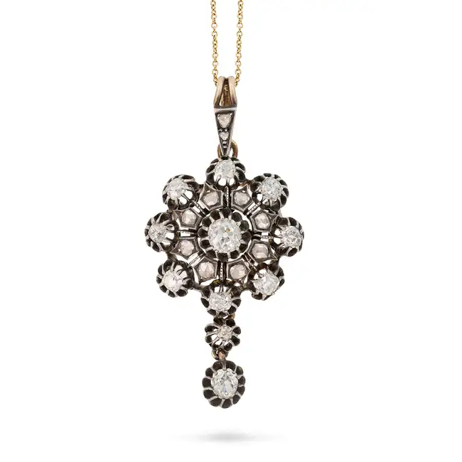 AN ANTIQUE DIAMOND PENDANT, CIRCA 1880 the pendant set with a cluster of old cut diamonds,