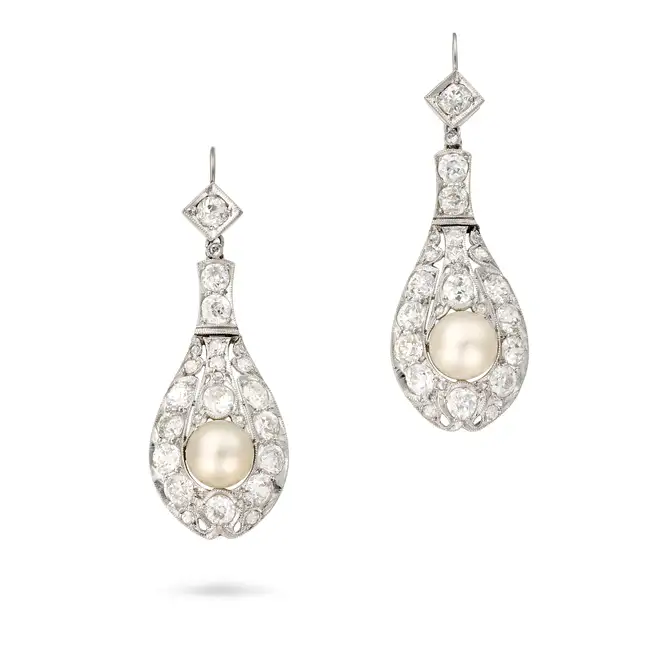 A PAIR OF FINE ANTIQUE NATURAL SALTWATER PEARL AND DIAMOND DROP EARRINGS each openwork tapering drop
