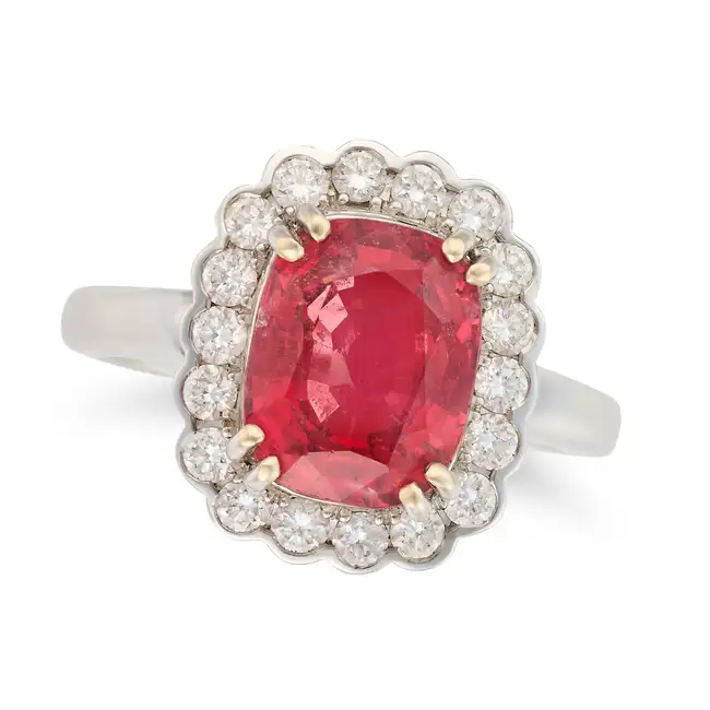 A 3.80 CARAT BURMA NO HEAT SPINEL AND DIAMOND CLUSTER RING set with a cushion cut spinel of 3.80