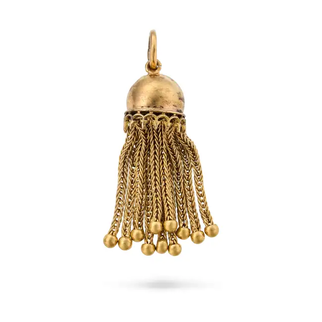 AN ANTIQUE TASSEL PENDANT the articulated pendant suspending fringes of braided tassels, no assay