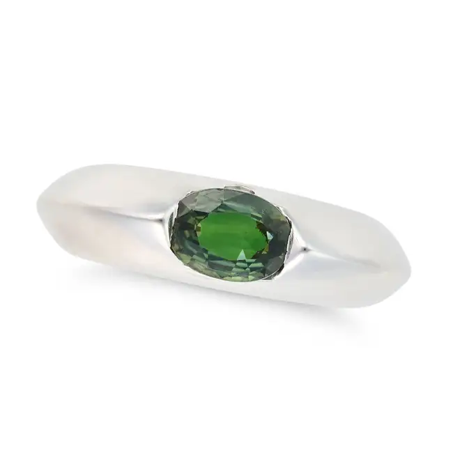 PIAGET, A GREEN SAPPHIRE AND DIAMOND RING, 1998 set with a cushion cut green sapphire, accented by a