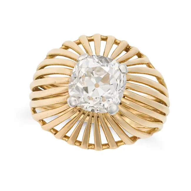 CHAUMET, A FINE VINTAGE DIAMOND DRESS RING in 18ct yellow gold and platinum, set with an old cut