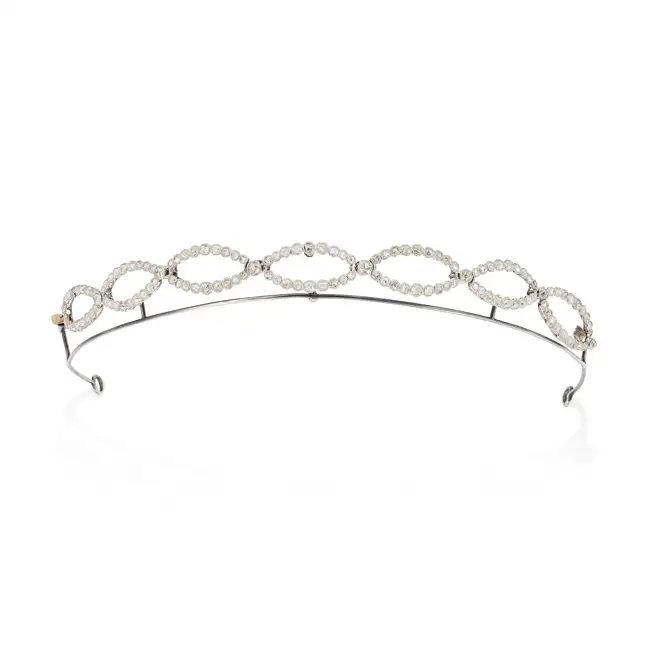 AN ANTIQUE DIAMOND TIARA / BRACELET, EARLY 20TH CENTURY in platinum and 18ct yellow gold, comprising