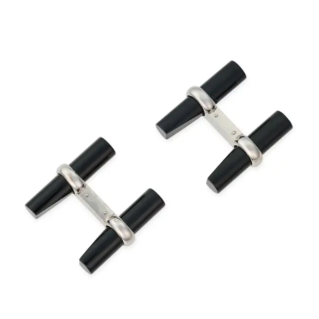 VAN CLEEF & ARPELS, A PAIR OF ONYX CUFFLINKS in 18ct white gold, each set with two polished onyx