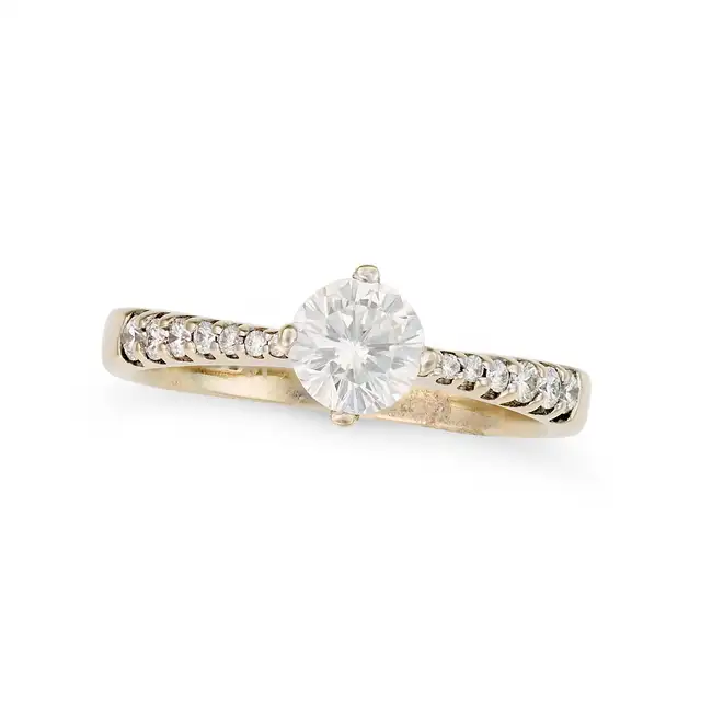 A SOLITAIRE DIAMOND RING in 18ct gold, set with a round brilliant cut diamond of 0.53 carats, the
