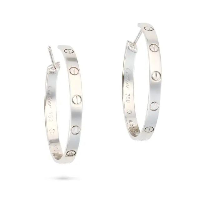 CARTIER, A PAIR OF LOVE HOOP EARRINGS in 18ct white gold, each hoop punctuated by screw head motifs,