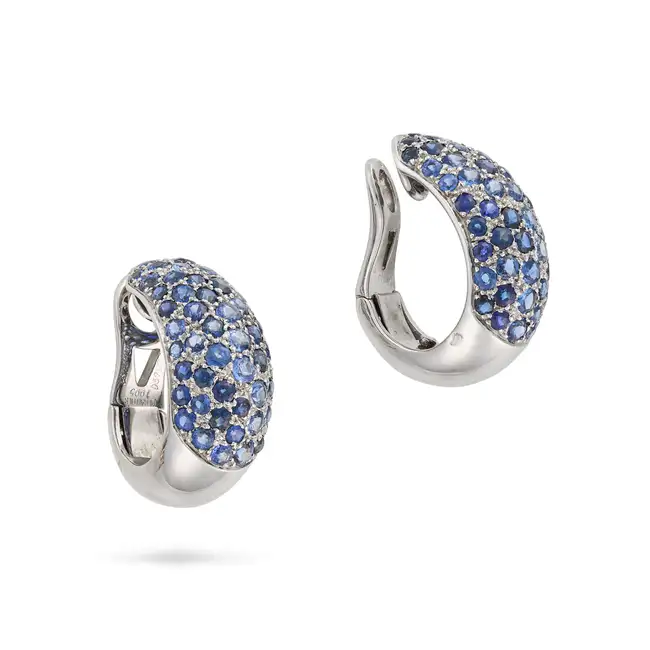 CARTIER, A PAIR OF SAPPHIRE CLIP EARRINGS, 1995 in 18ct white gold, each designed as a hoop, pave