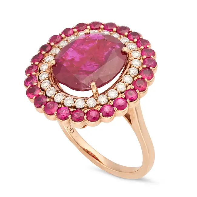 A 4.82 CARAT UNHEATED RUBY AND DIAMOND RING set with a cushion cut ruby of 4.82 carats in a double