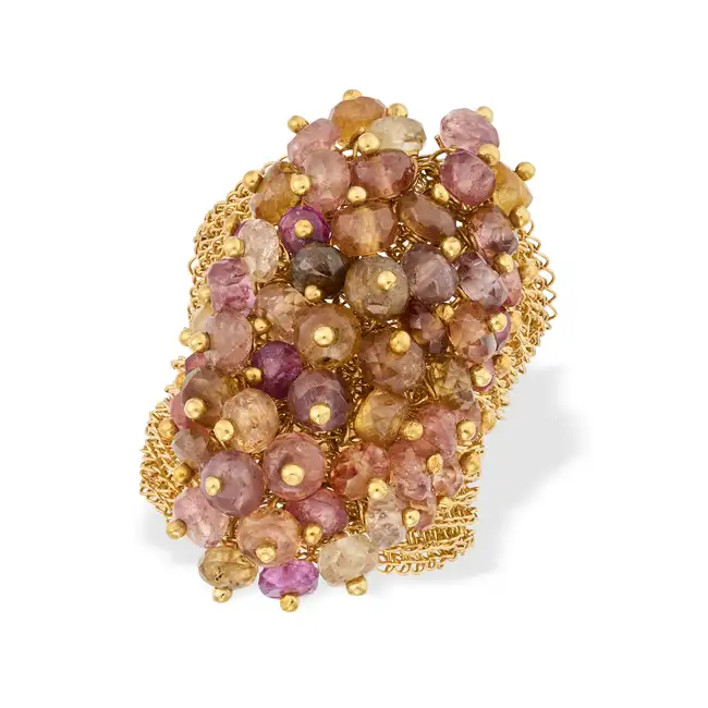 A MULTICOLOUR TOURMALINE CLUSTER DRESS RING the ring comprising mesh, accented by a cluster of