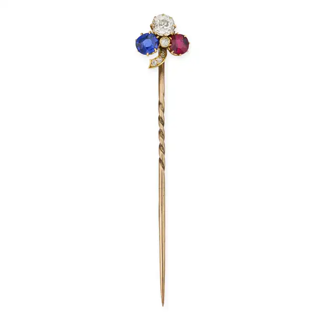 A FINE ANTIQUE IMPERIAL RUSSIAN RUBY, SAPPHIRE AND DIAMOND CLOVER STICK / TIE PIN designed as a