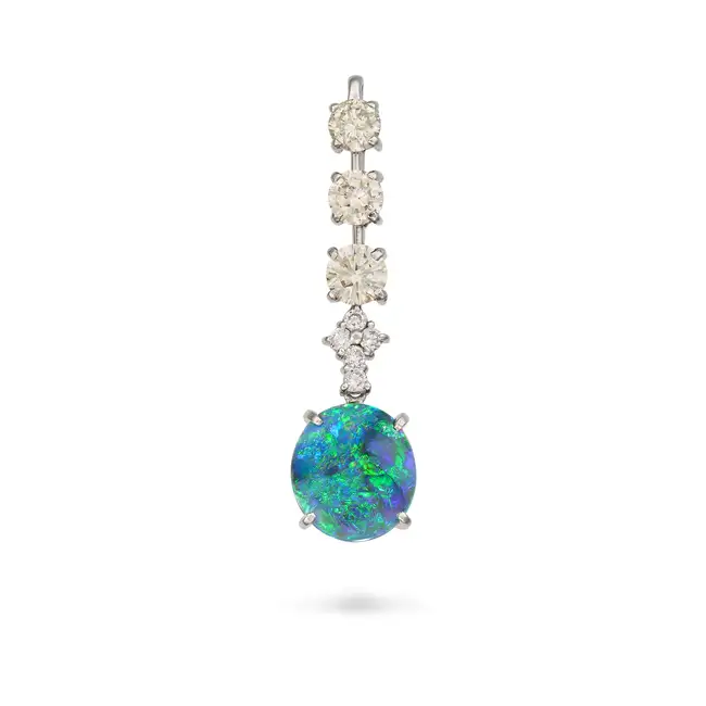 A BLACK OPAL AND DIAMOND PENDANT set with an oval cabochon opal of 2.01 carats, accented by round