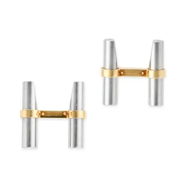 CARTIER, A PAIR OF GOLD AND STEEL CUFFLINKS in 18ct yellow gold and steel, each comprising two steel