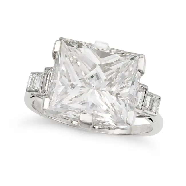 A 9.01 CARAT DIAMOND RING in platinum, set with a rectangular modified brilliant cut diamond of 9.01