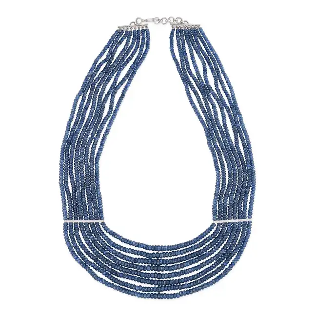 A SAPPHIRE BEAD AND DIAMOND NECKLACE comprising eight rows of facetted sapphire beads, the two