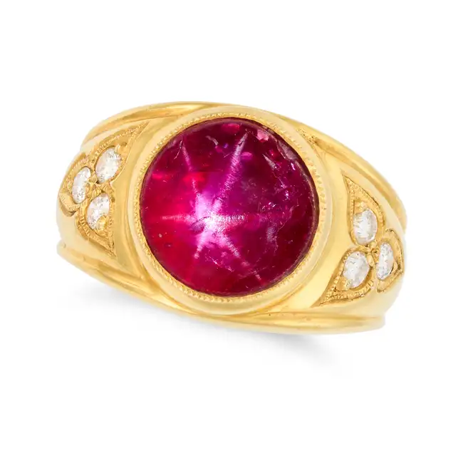 A BURMA NO HEAT STAR RUBY RING set with a round cabochon star ruby of approximately 5.00 carats,