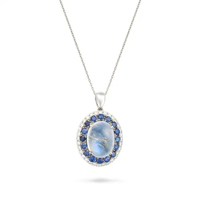 A MOONSTONE, SAPPHIRE AND DIAMOND PENDANT NECKLACE the pendant set with an oval cabochon moonstone