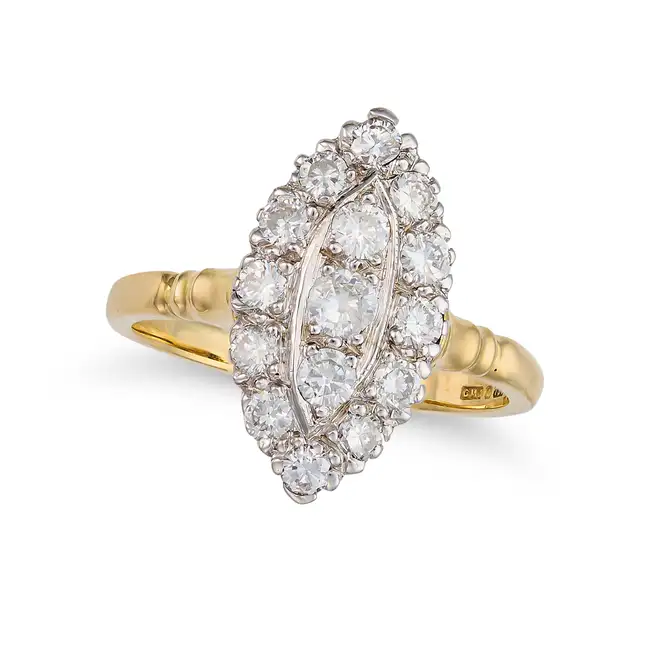 A DIAMOND NAVETTE RING in 18ct yellow gold, the navette face set with round brilliant cut