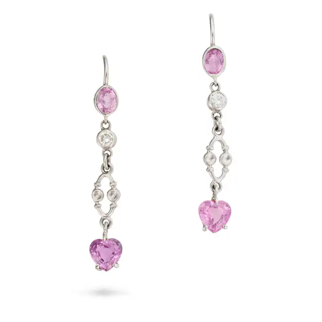 A PAIR OF PINK SAPPHIRE AND DIAMOND DROP EARRINGS each suspending a heart cut pink sapphire drop,